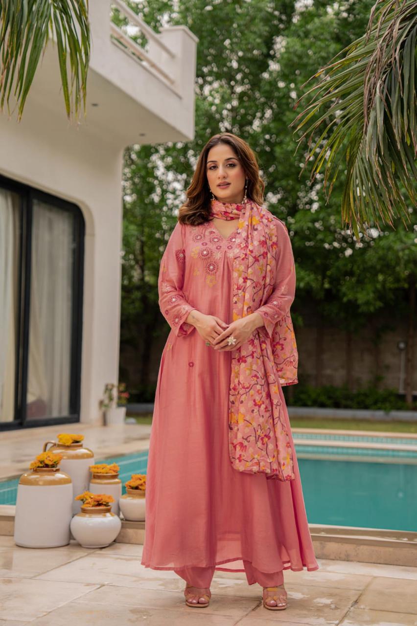 Pink Mul Chanderi suit paired with weaved floral dupatta