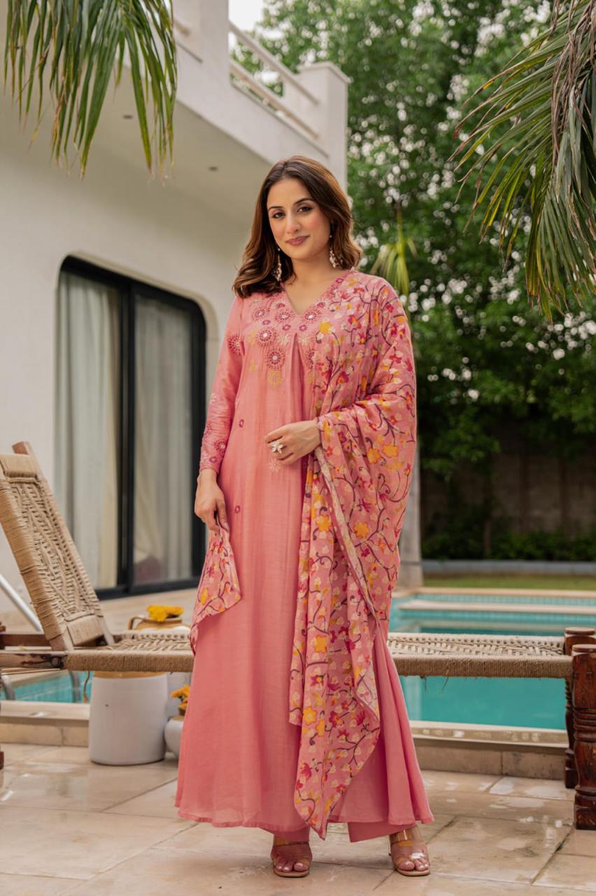 Pink Mul Chanderi suit paired with weaved floral dupatta
