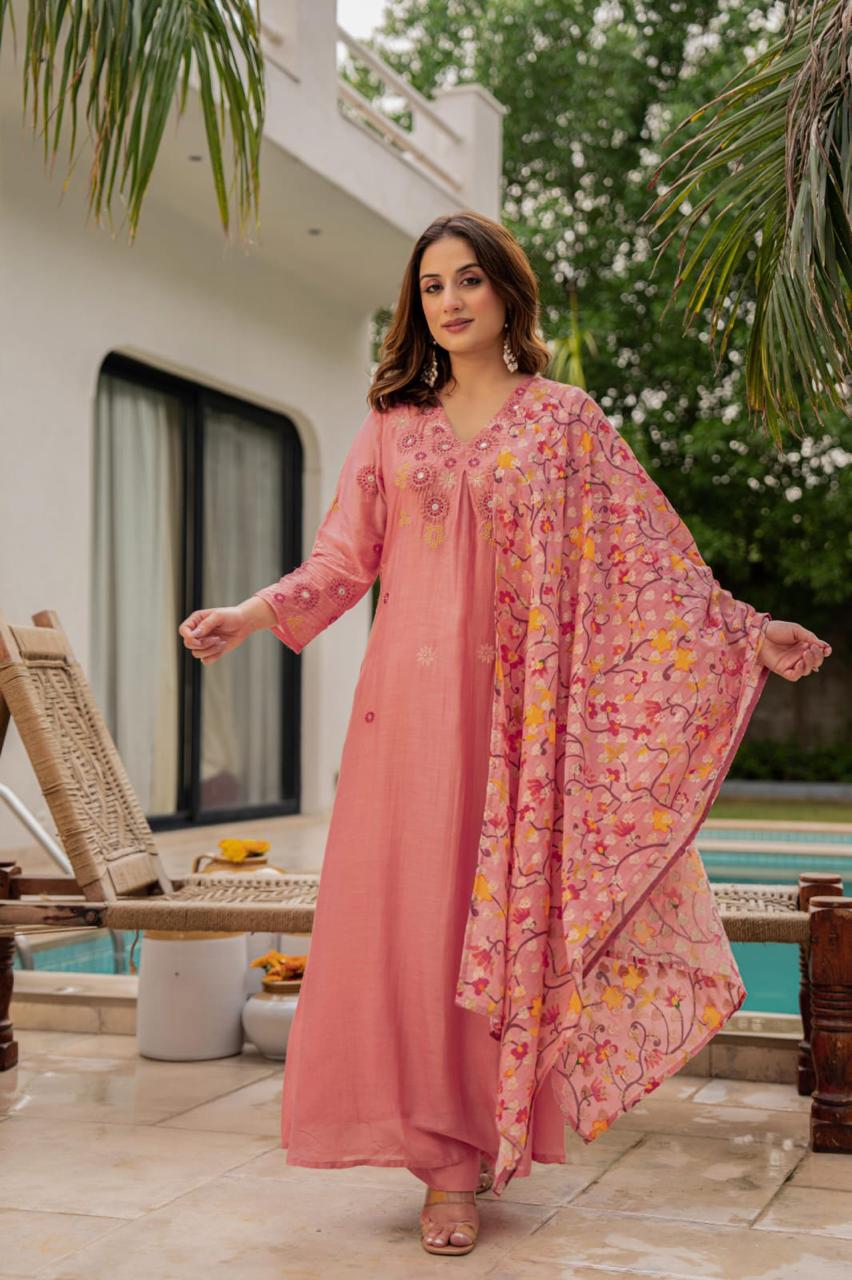 Pink Mul Chanderi suit paired with weaved floral dupatta