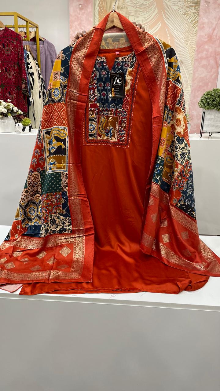 Gaji silk suit set paired with a pretty dupatta in red