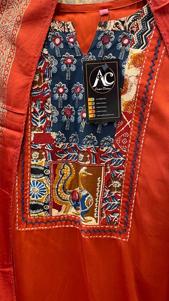 Gaji silk suit set paired with a pretty dupatta in red