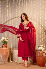 Simple elegant zari embroidered dola silk suit paired with organza