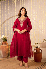 Simple elegant zari embroidered dola silk suit paired with organza