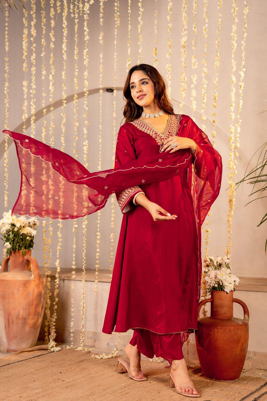 Simple elegant zari embroidered dola silk suit paired with organza