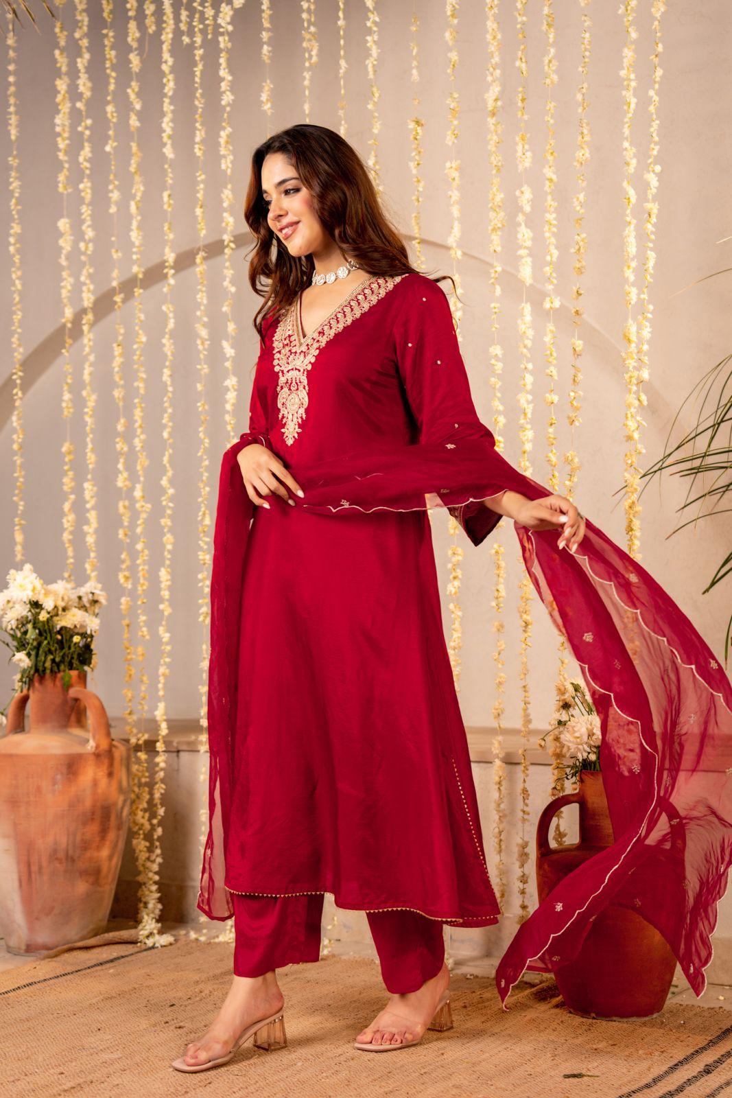 Simple elegant zari embroidered dola silk suit paired with organza