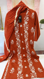 Pure cotton embroidered suit set paired with Lehariya dupatta in rust
