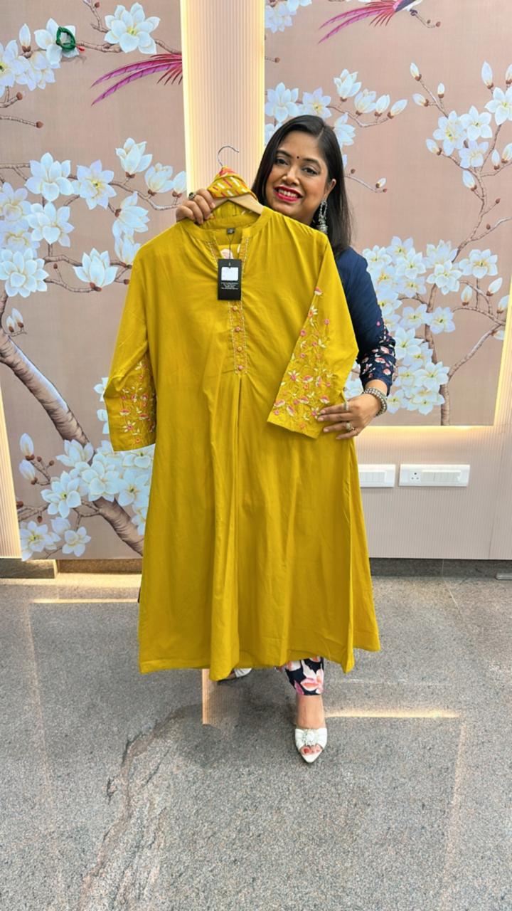 Pure cotton designer back and hand embroidered full suit in yellow