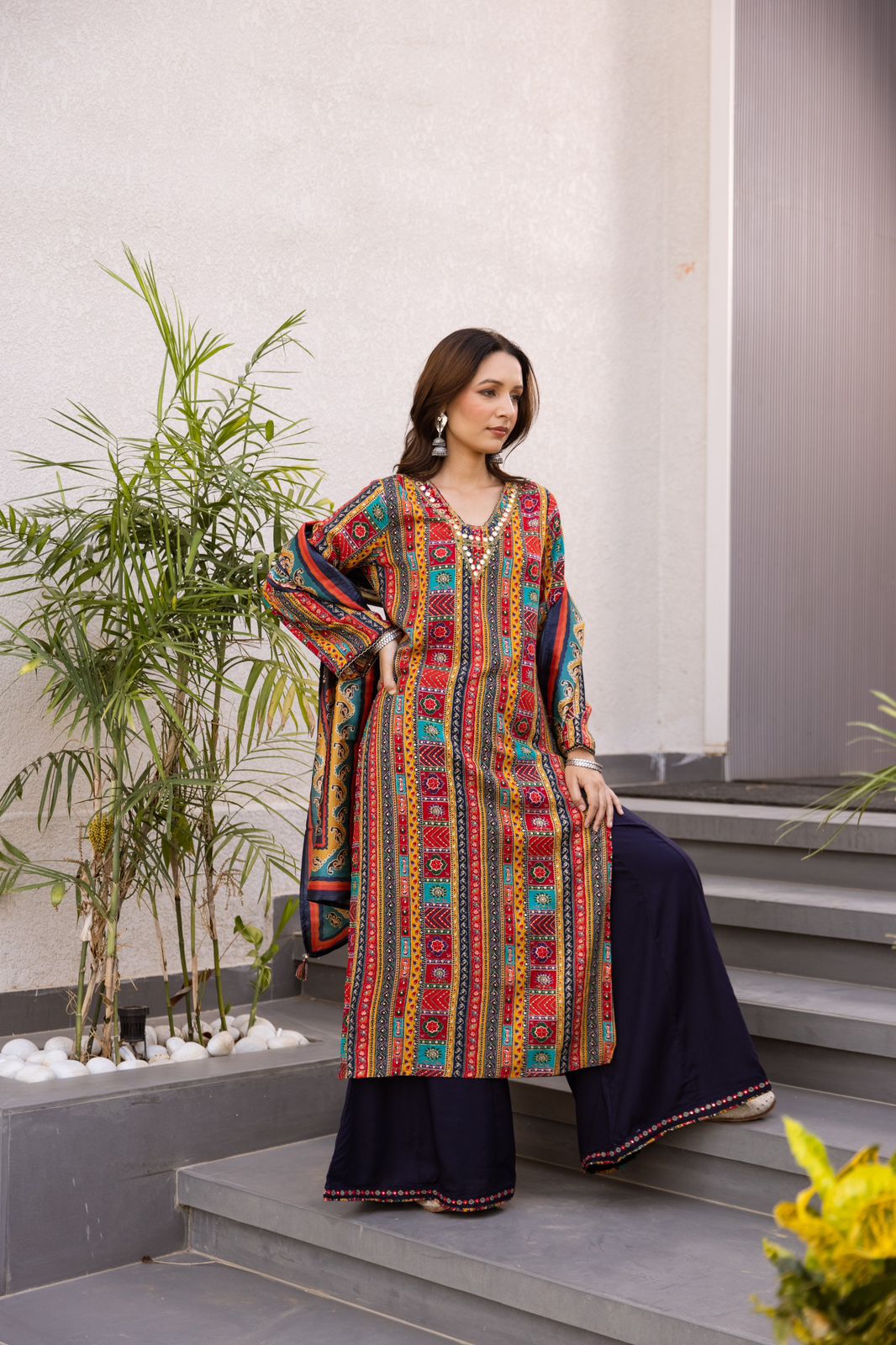 Heavy rayon V neck kurta paired with skirt palazzo