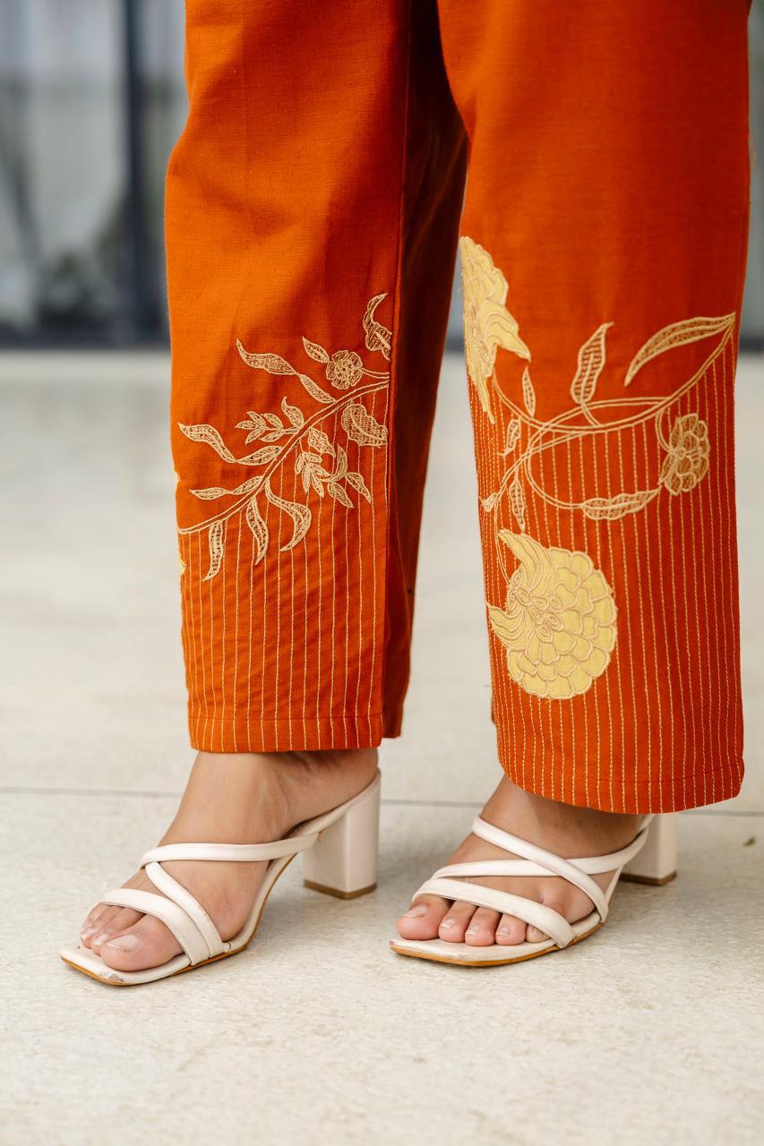 Smart appliqué work cotton co rd in rust