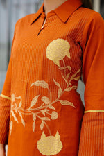 Smart appliqué work cotton co rd in rust