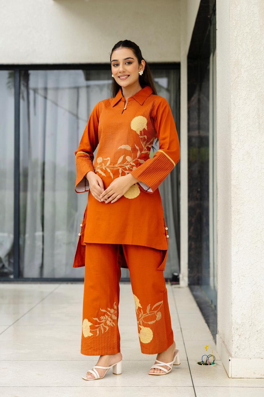 Smart appliqué work cotton co rd in rust