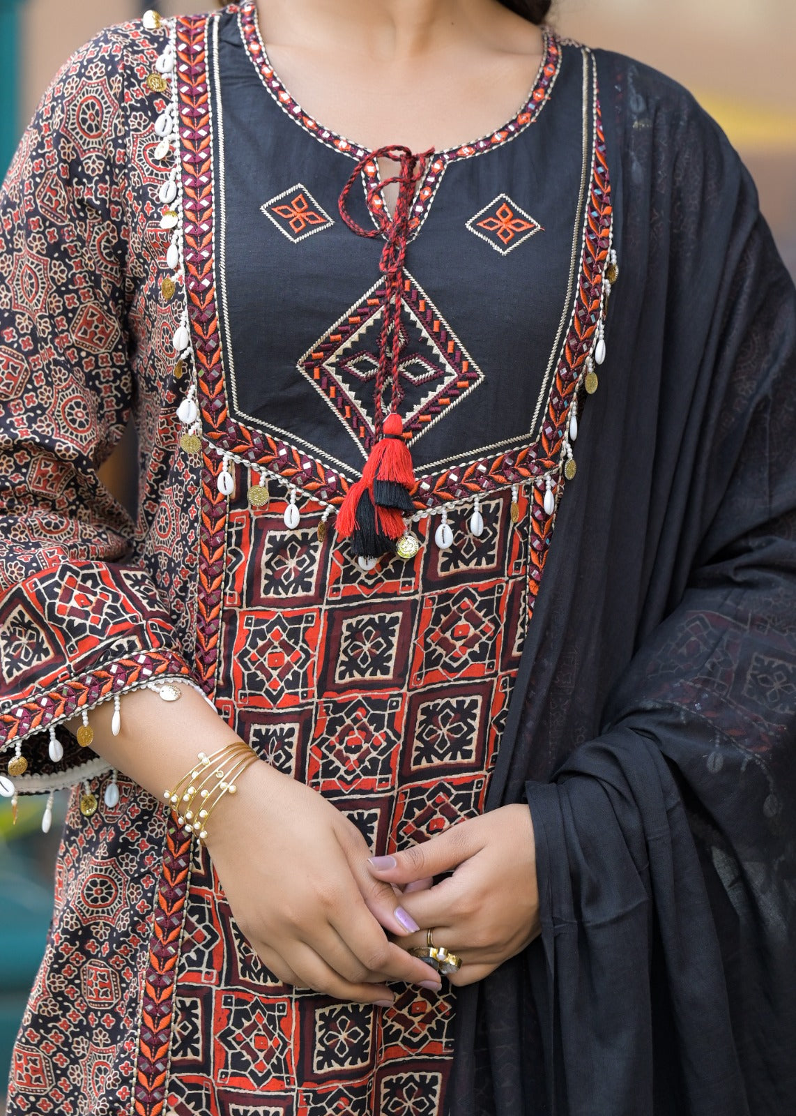 Smart cotton ajrakh beautifully embellished suit set in black