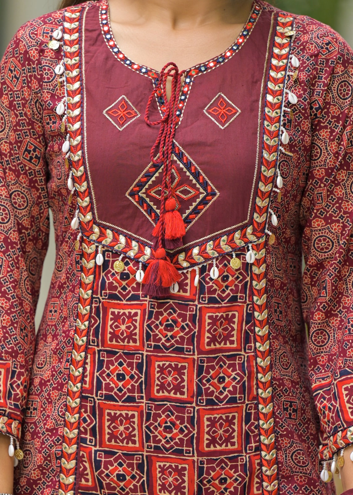 Smart cotton ajrakh beautifully embellished suit set in red