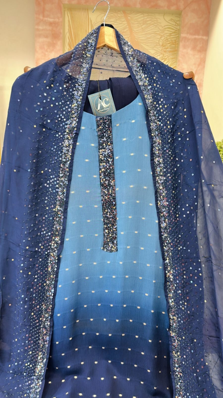 Heavy chinon with full gold Zari weaving suit paired with crepe embellished dupatta in blue