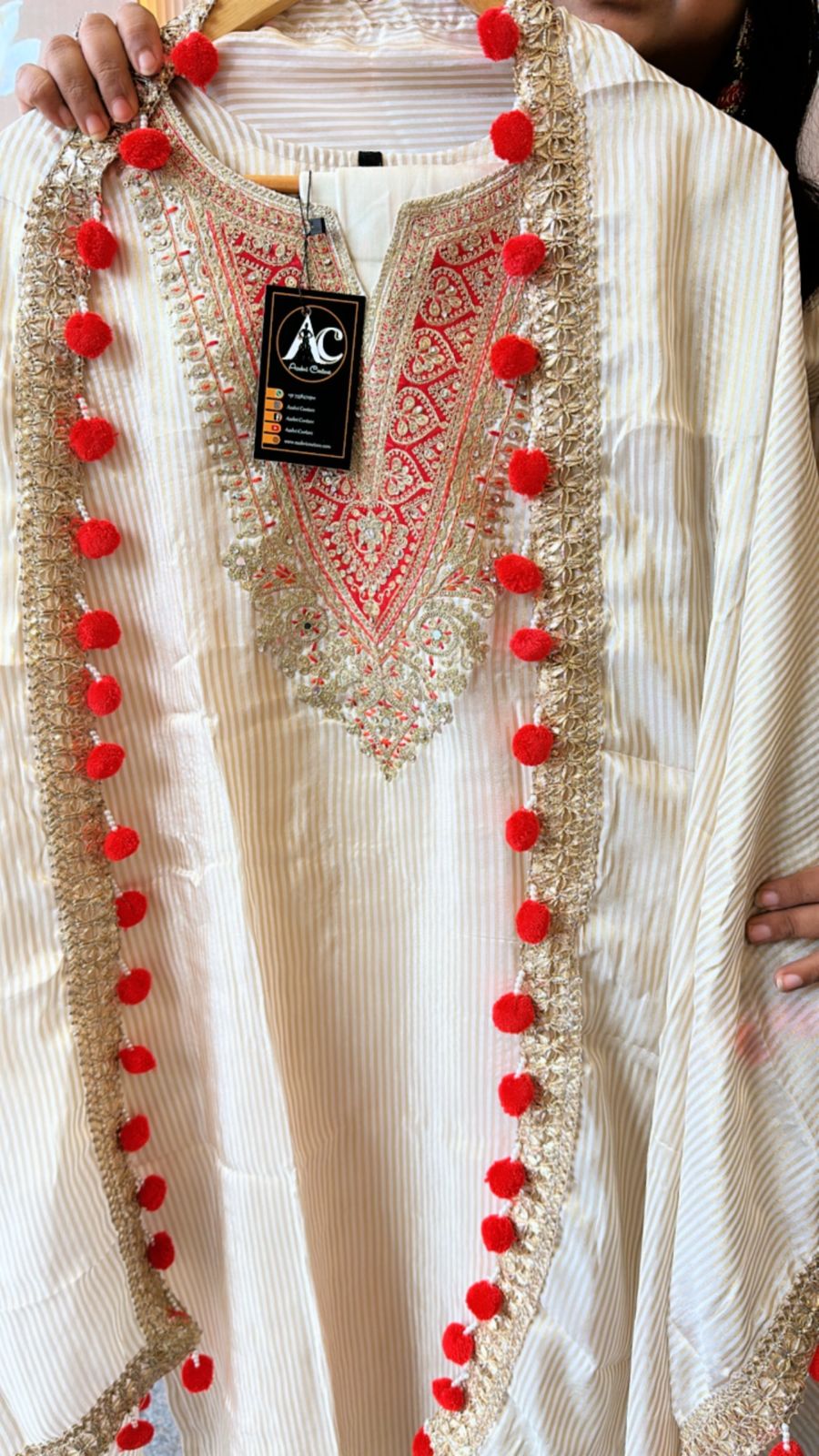 Super smart shimmer tissue suit with Pom Pom lace detailing in red (advisable to go for a size up )