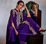 Beautiful silk set paired with organza cape in purple