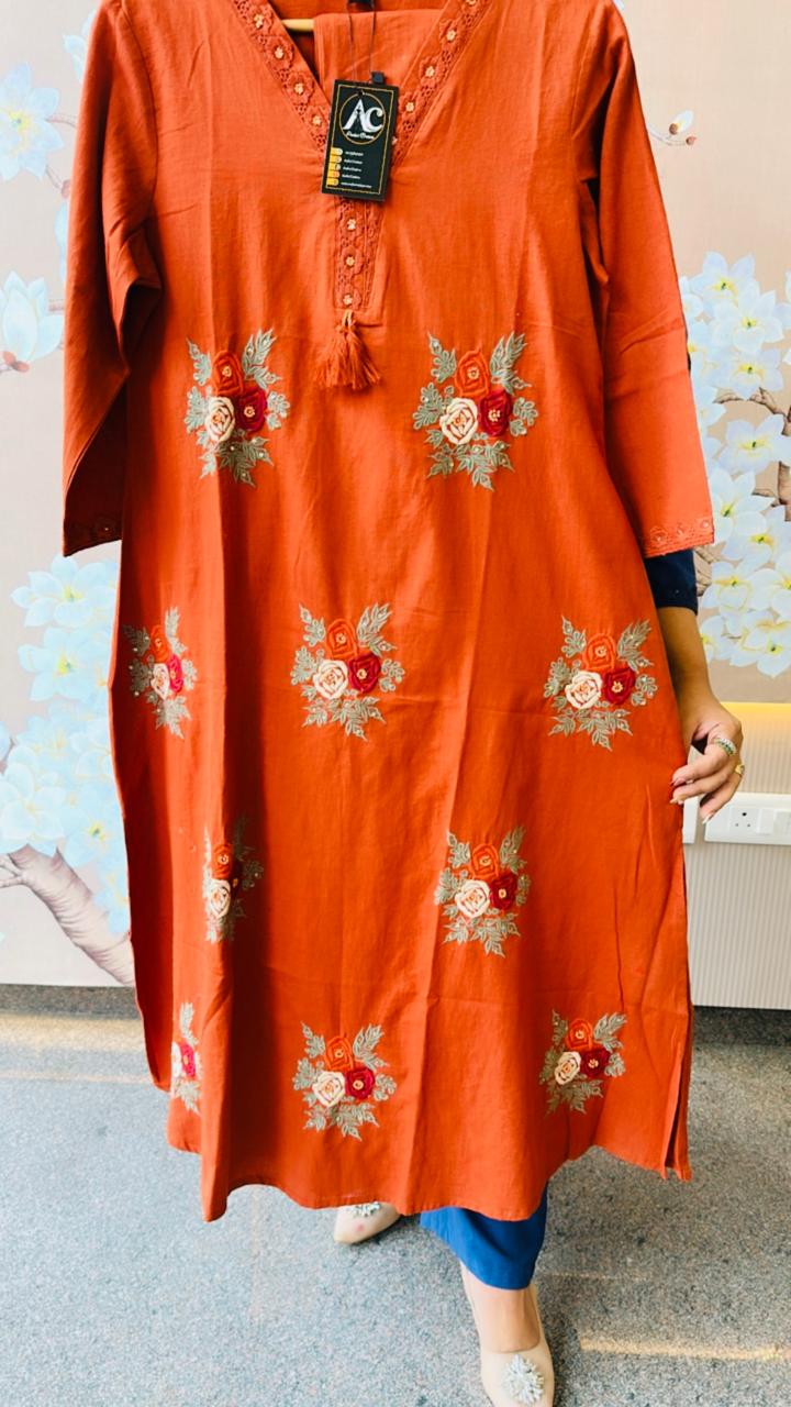 Gorgeous pure cotton suit embroidered in rust