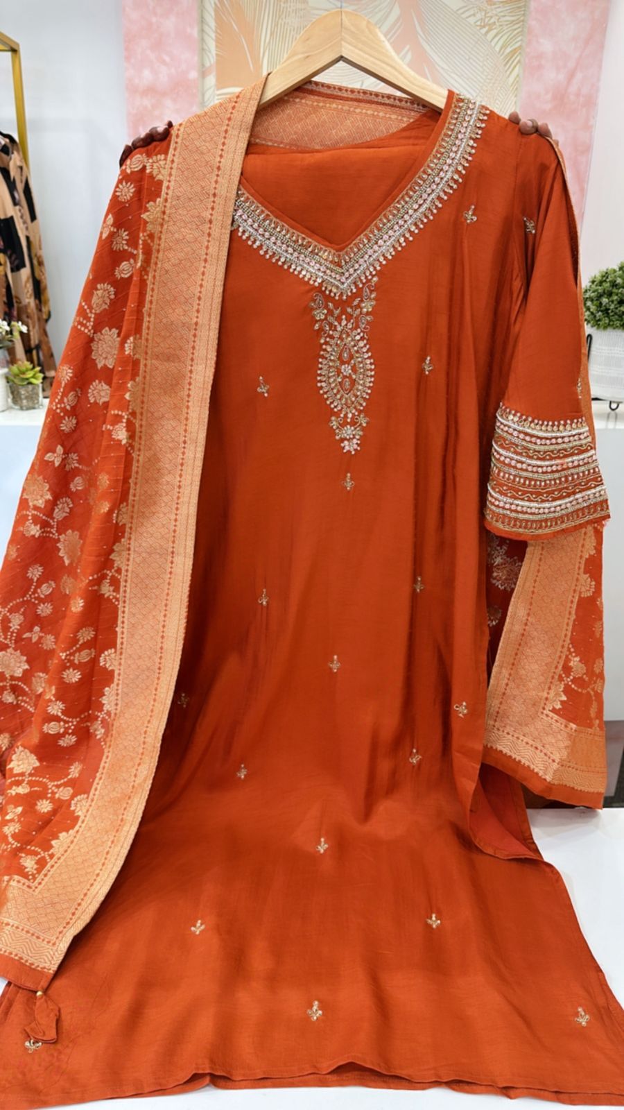 Pretty dola silk hand work suit set paired with Banarasi dupatta in orange