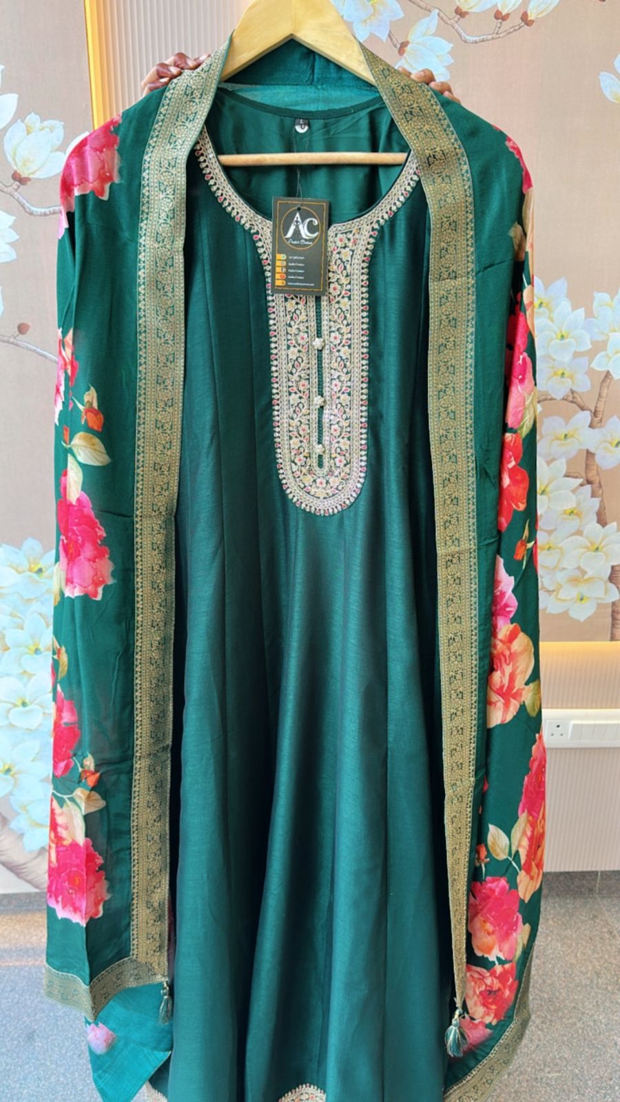 Dola silk Anarkali suit paired with floral dupatta in green