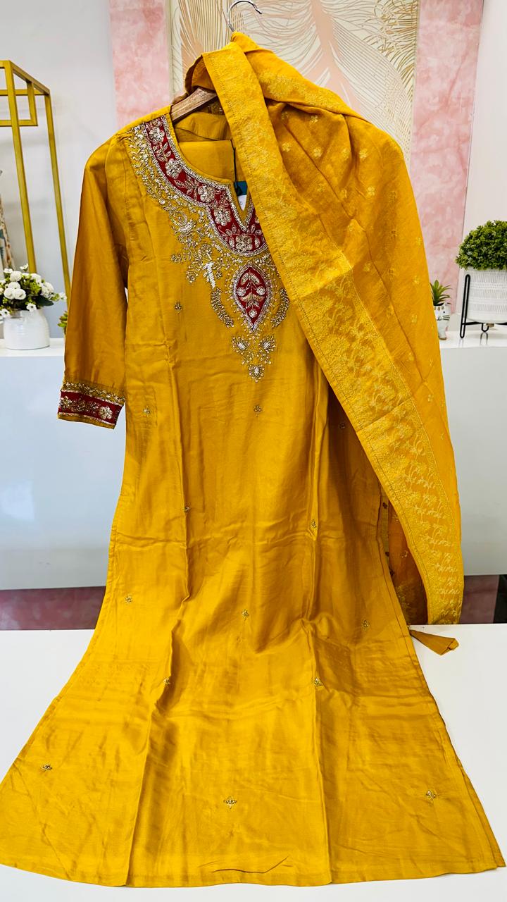 Dola silk hand work suit set paired with Banarasi dupatta in yellow
