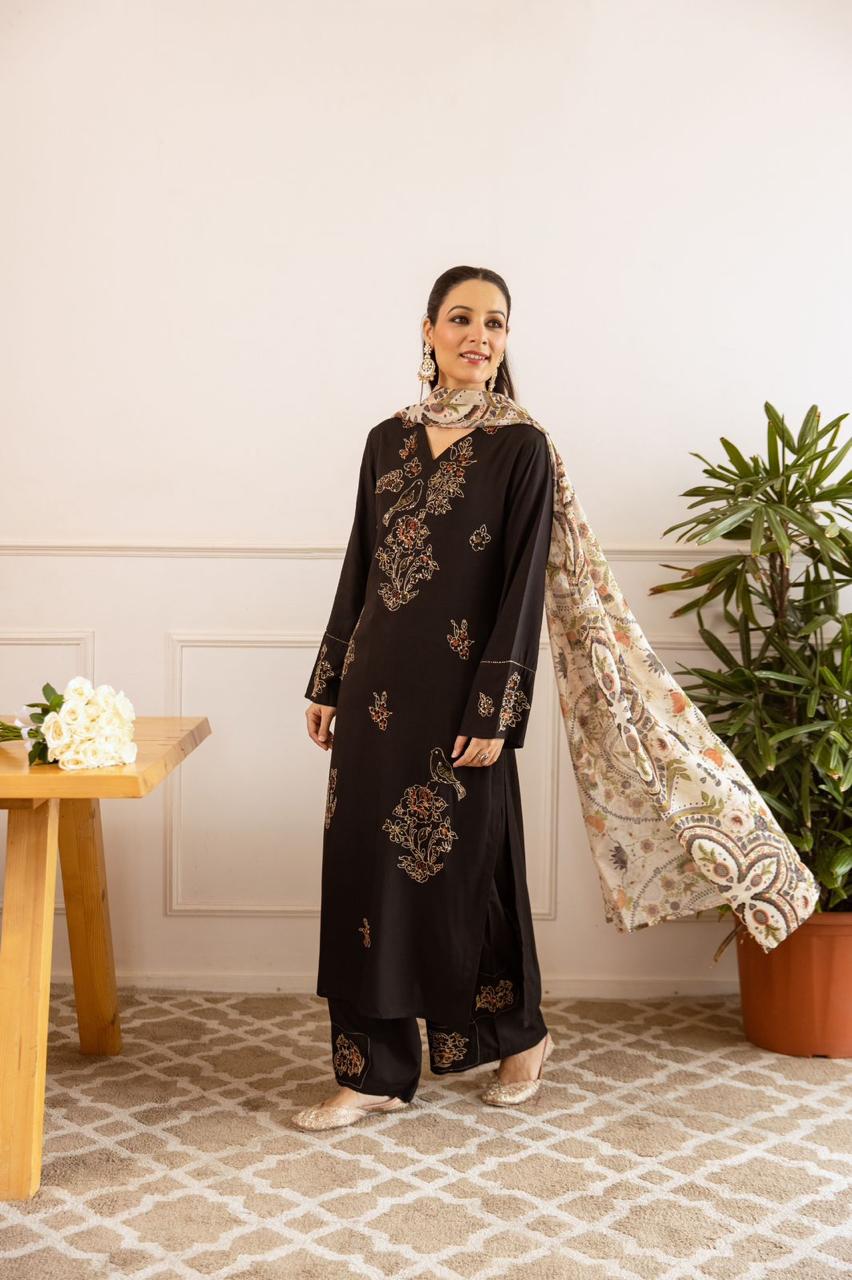 Heavy rayon embroidered suit set paired with soft orgenza dupatta in black