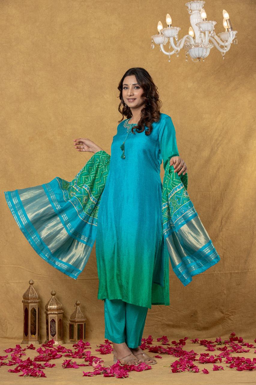 Russian silk paired with Patola dupatta in rama colour