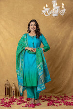 Russian silk paired with Patola dupatta in rama colour