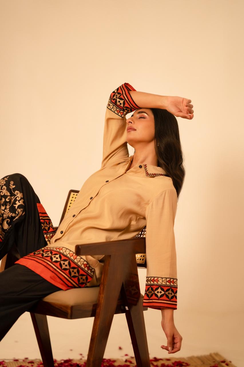 Pretty muslin embroidered black n orange co ord