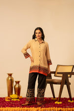 Pretty muslin embroidered black n orange co ord