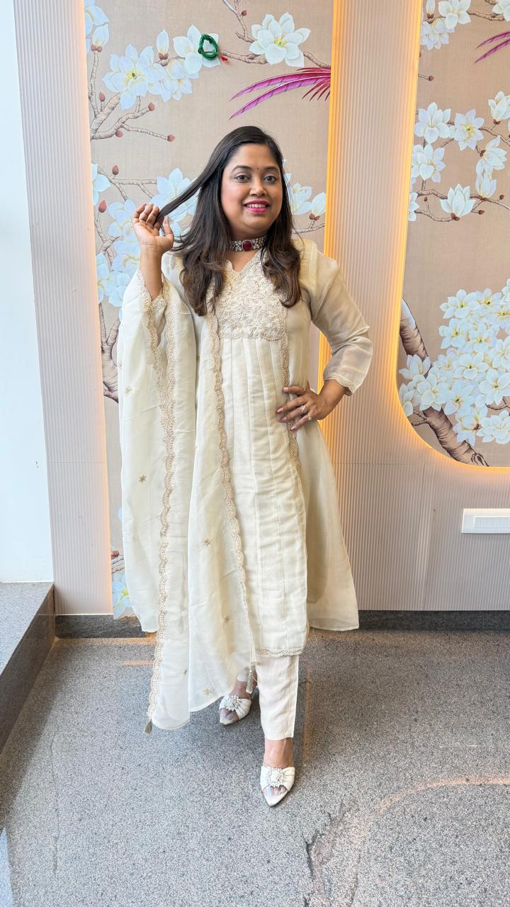 Premium tissue zari detailing suit in ivory
