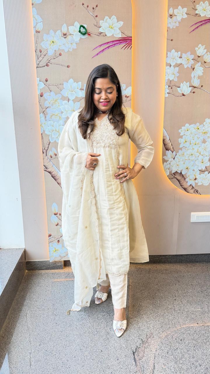 Premium tissue zari detailing suit in ivory