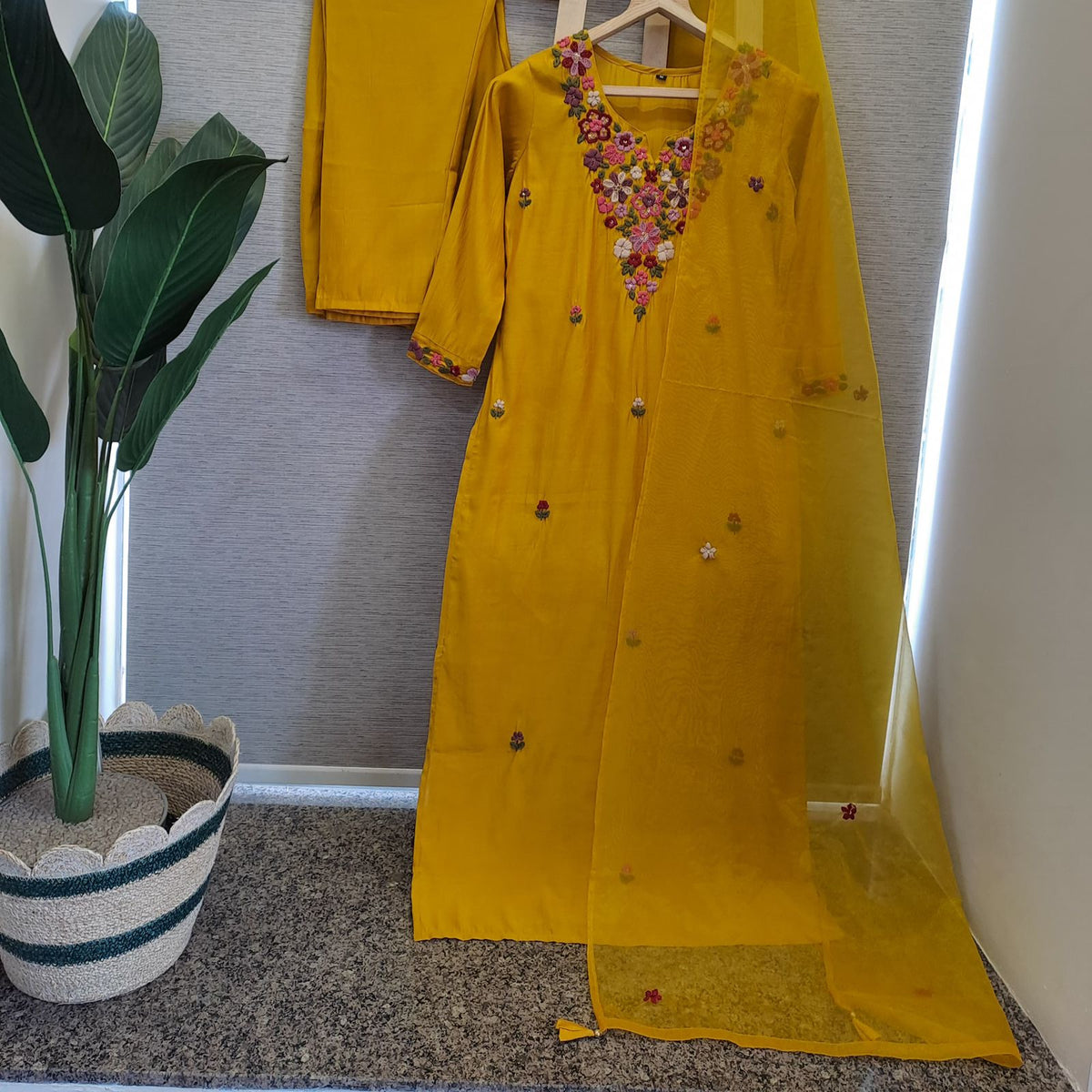 Premium Modale embroidered suit set paired with organza dupatta in yellow