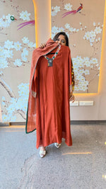 Premium zari detailing on sleeves paired with a tissue dupatta