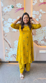 Pretty cotton Ikkat printed V neck plazzo pant suit set in yellow