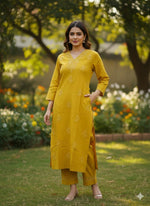Beautiful chikankari heavy slub cotton kurta pant with lace detailing in yellow