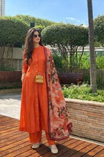 Soft muslin suit set paired with a pretty dupatta