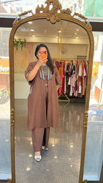 Super smart designer jacket paired with plazzo and a crop top