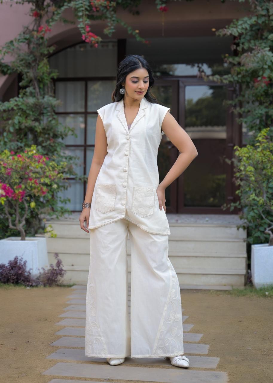 Super smart sleeveless embroidered co ord in white
