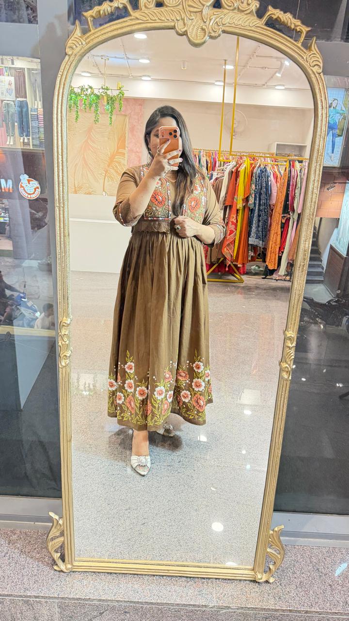 Pure cotton embroidered and applique digital printed gown paired with a detachable jacket