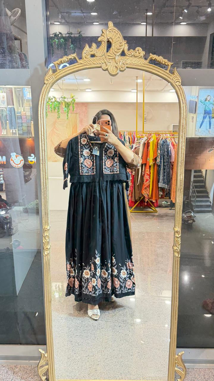 Pure cotton embroidered and applique digital printed gown paired with a detachable jacket