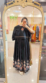 Pure cotton embroidered and applique digital printed gown paired with a detachable jacket