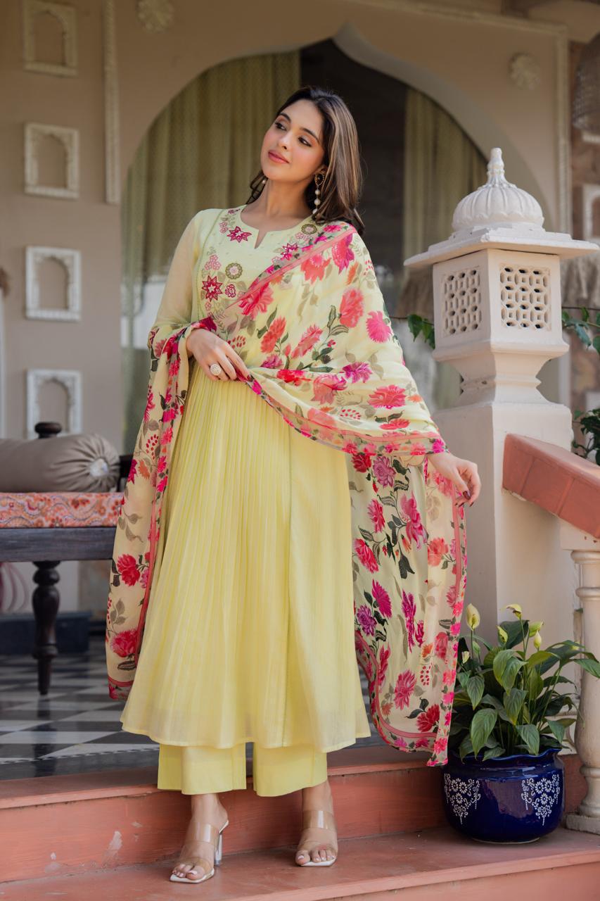 Premium cotton loose fitted suit set paired with floral dupatta in yellow