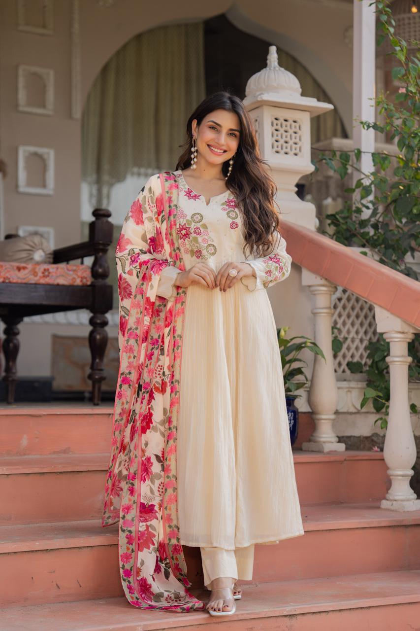 Premium cotton loose fitted suit set paired with floral dupatta in cream