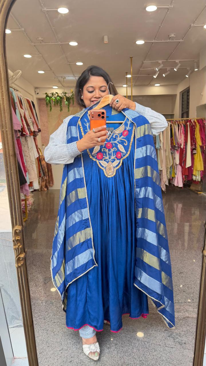 Premium dola silk with heavy hand work paired with a tissue dupatta in royal blue