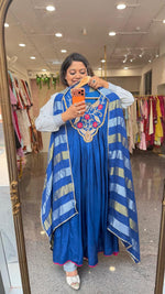 Premium dola silk with heavy hand work paired with a tissue dupatta in royal blue