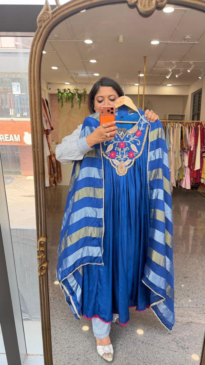 Premium dola silk with heavy hand work paired with a tissue dupatta in royal blue