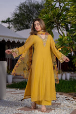 Stylish crush cotton designer suit set in yellow paired with a Kalamkari dupatta