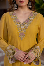 Stylish crush cotton designer suit set in yellow paired with a Kalamkari dupatta