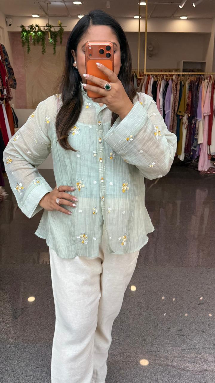 Fully embroidered back and front comes with inner pure Mul chanderi loose fitted shirt paired with pants in mint green