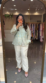 Fully embroidered back and front comes with inner pure Mul chanderi loose fitted shirt paired with pants in mint green